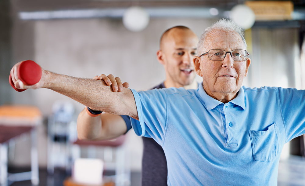 man in physician therapy with physician assisting